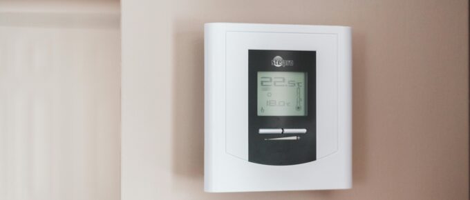 Photo by Erik Mclean: https://www.pexels.com/photo/white-thermostat-hanging-on-the-wall-7616651/